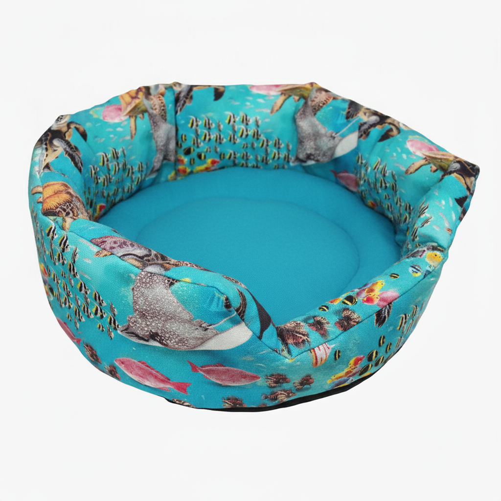 Cuddle Cup in Under the Sea fabric with matching turquoise inner